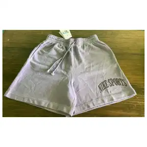 SHORT FELPA NIKE WOMEN SIZE M miniatura 1